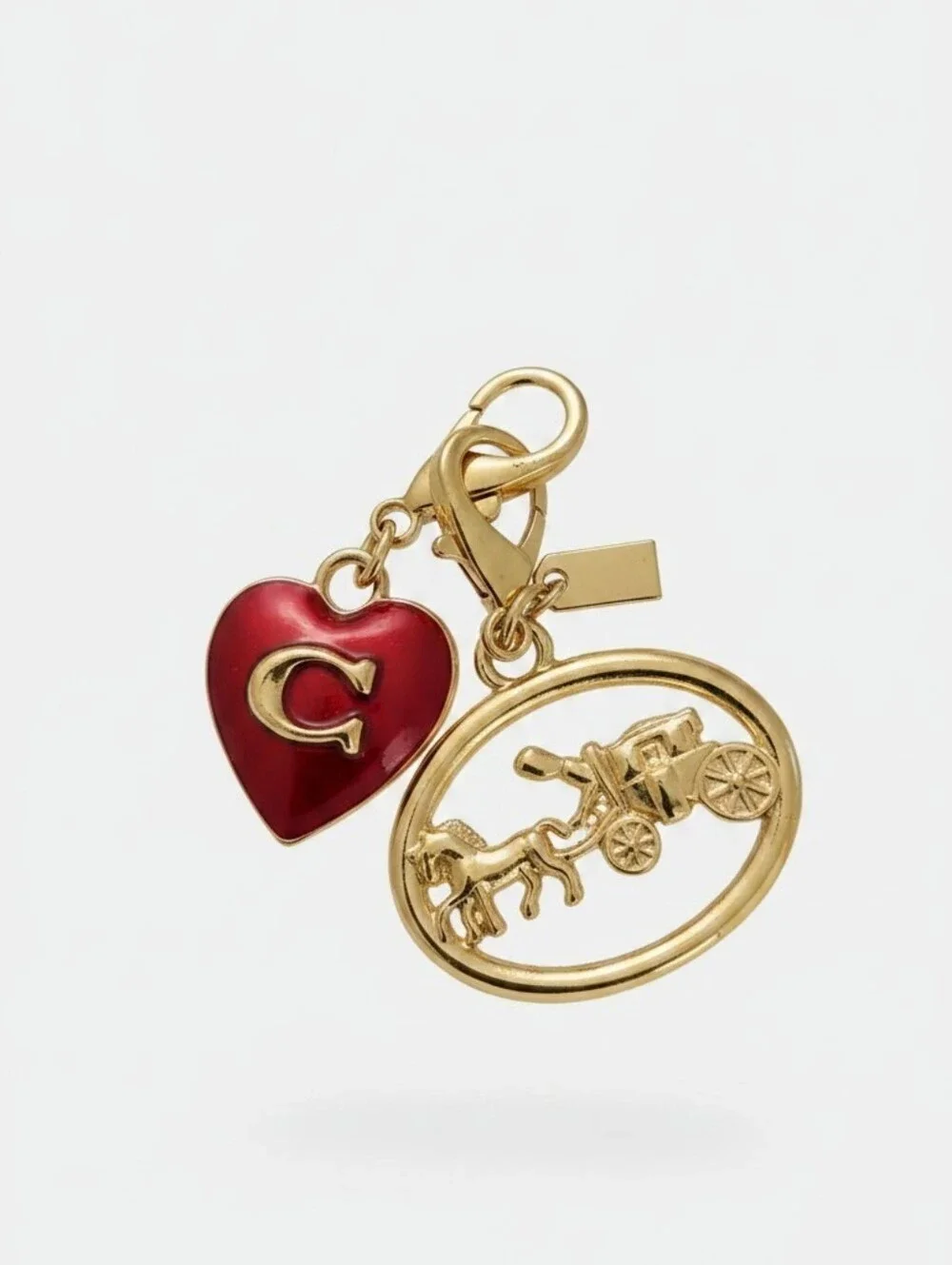 SASSIFIED  BOUTIQUE Nwt Gold Carriage Charm with Red Heart Tag